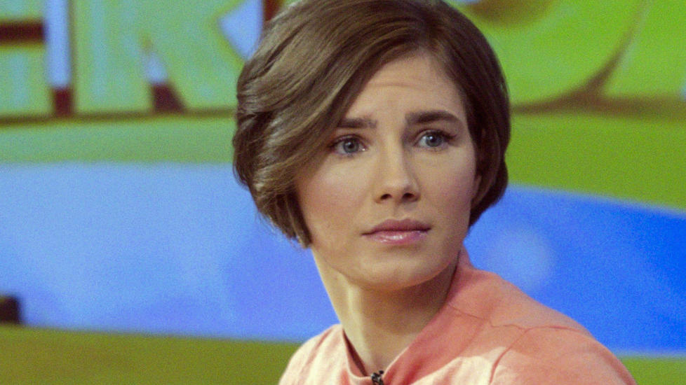 Amanda Knox reacts while being interviewed on the set of ABC's Good Morning America in New York January 31, 2014. Italy's conviction of Amanda Knox for the murder of her British roommate when the two were exchange students together could spur a drawn-out fight over extradition in the United States, where supporters contend she is the victim of a faulty foreign justice system.  REUTERS/Andrew Kelly (UNITED STATES - Tags: CRIME LAW POLITICS MEDIA HEADSHOT)
